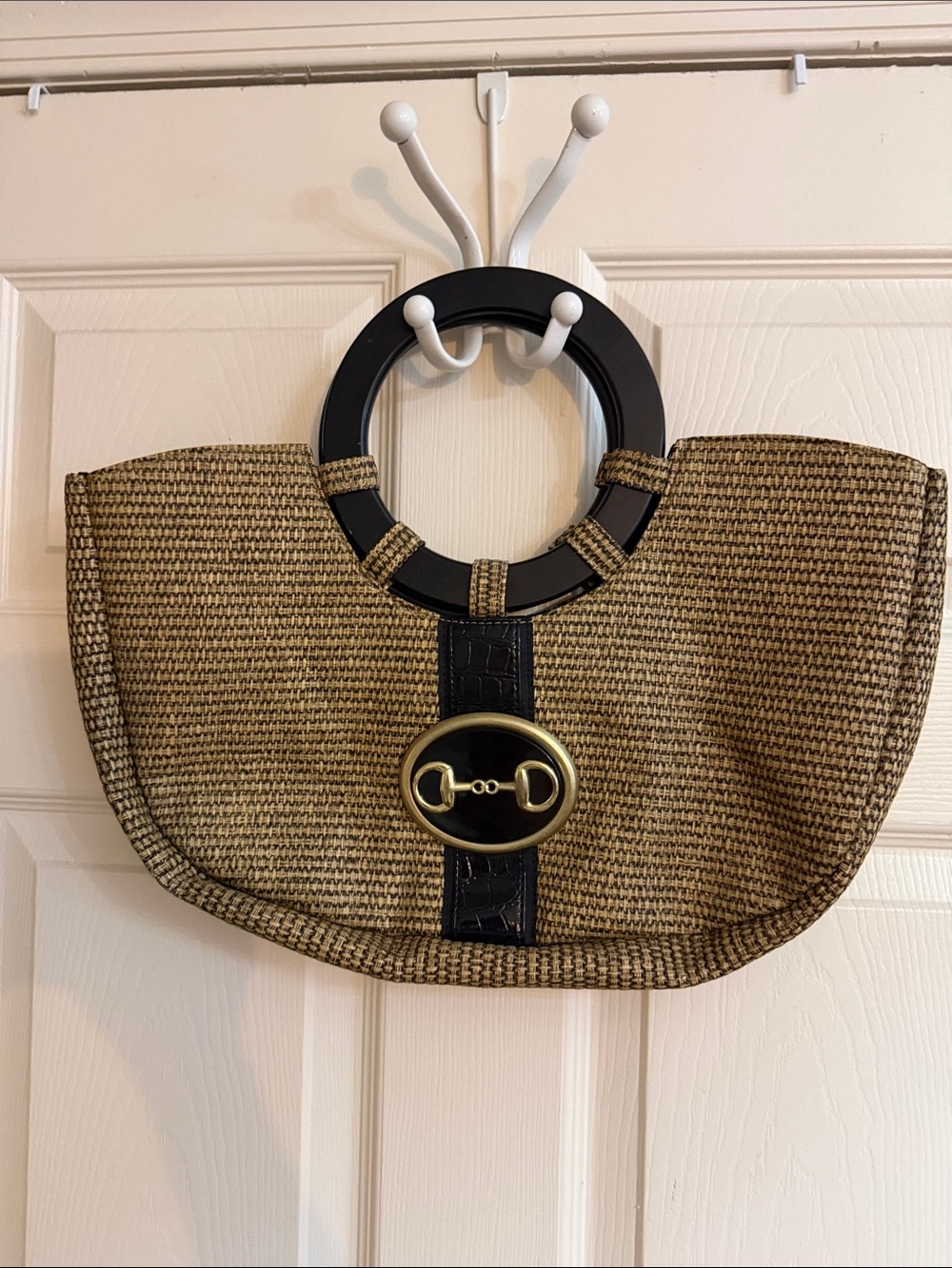 Braciano Brown Woven Tote with Black Ring Handles and Gold Emblem